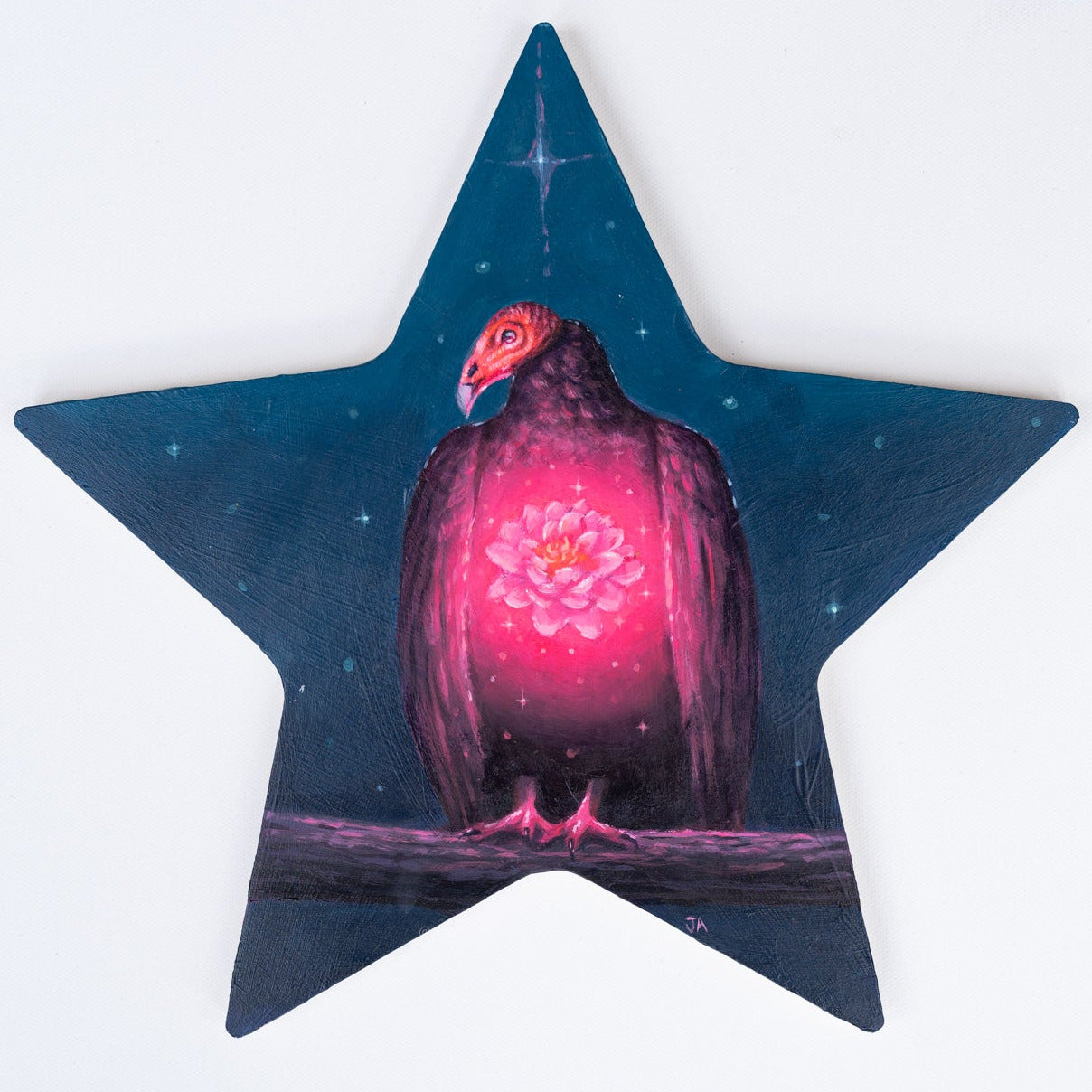 Star-shaped object with a turkey vulture and glowing red and purple plumage on a white background